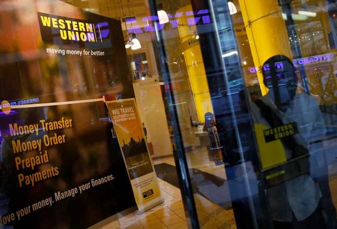 A person walks out of a Western Union branch in New York